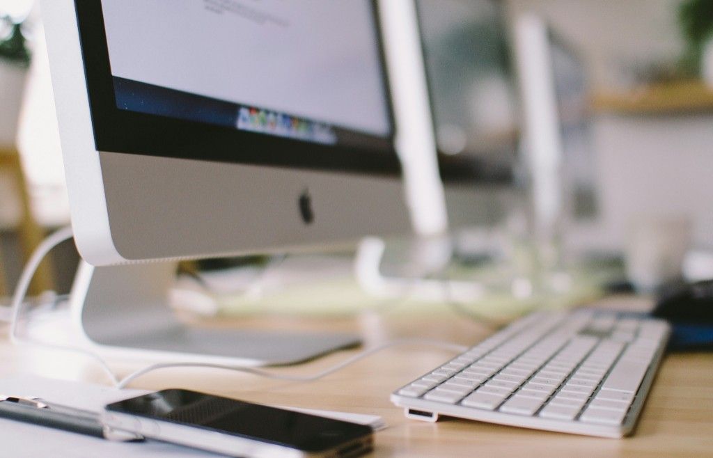 Workspace with a desktop computer and keyboard